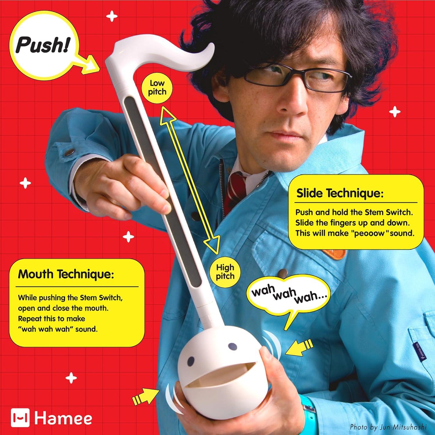 imageOtamatone Deluxe Electronic Musical Instrument for Adults Portable Synthesizer Digital Electric Music from Japan by CubeMaywa Denki Cool Stuff Gifts Unicorn English ManualRed Deluxe