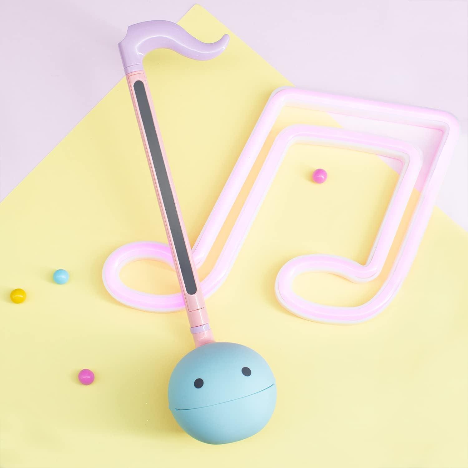 imageOtamatone Japanese Electronic Musical Instrument Portable Music Synthesizer from Japan by Maywa Denki Studio Award Winning Educational Fun Gift for Children Teens ampamp Adults BlueBlack White Unicorn Set
