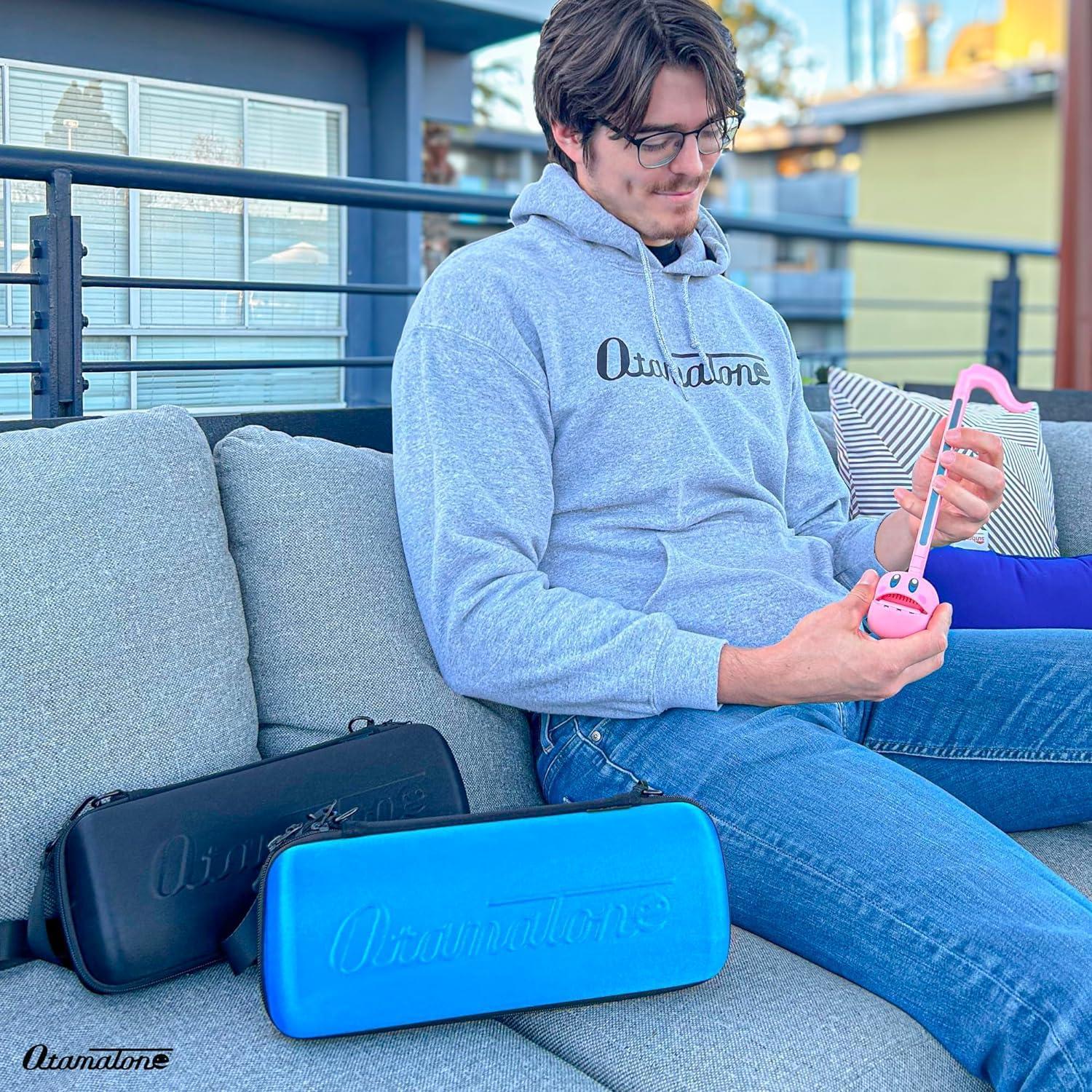 imageOtamatone Official Case for Otamatone Regular 107 inch Musical Instrument Toy Synthesizer Hard Shell Cover Smooth Fitted Protective Interior with Official Logo Strap Inner Zipper Pouch RedMatte Black